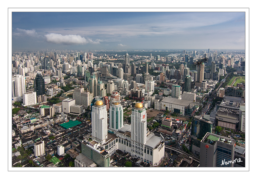 Blick vom Baiyoke Tower 2 
Bangkok ist eine große und sehr weitläufige Stadt. Administrativ ist sie in 50 Khets (Stadtteile) untergliedert.
laut Wikipedia
Schlüsselwörter: Thailand Bangkok Baiyoke Tower